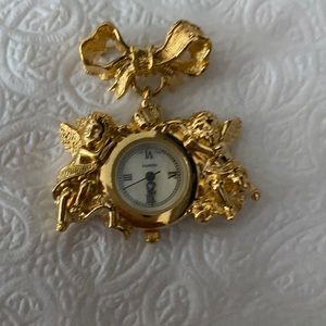 Clock brooch